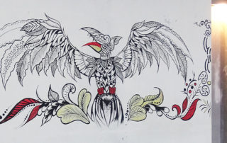 Zeichnung von Vogel an einer Wand