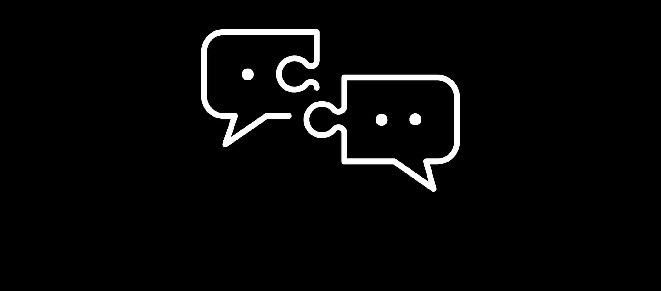 Schwarze Fläche mit zwei Sprechblasen in Puzzleform.